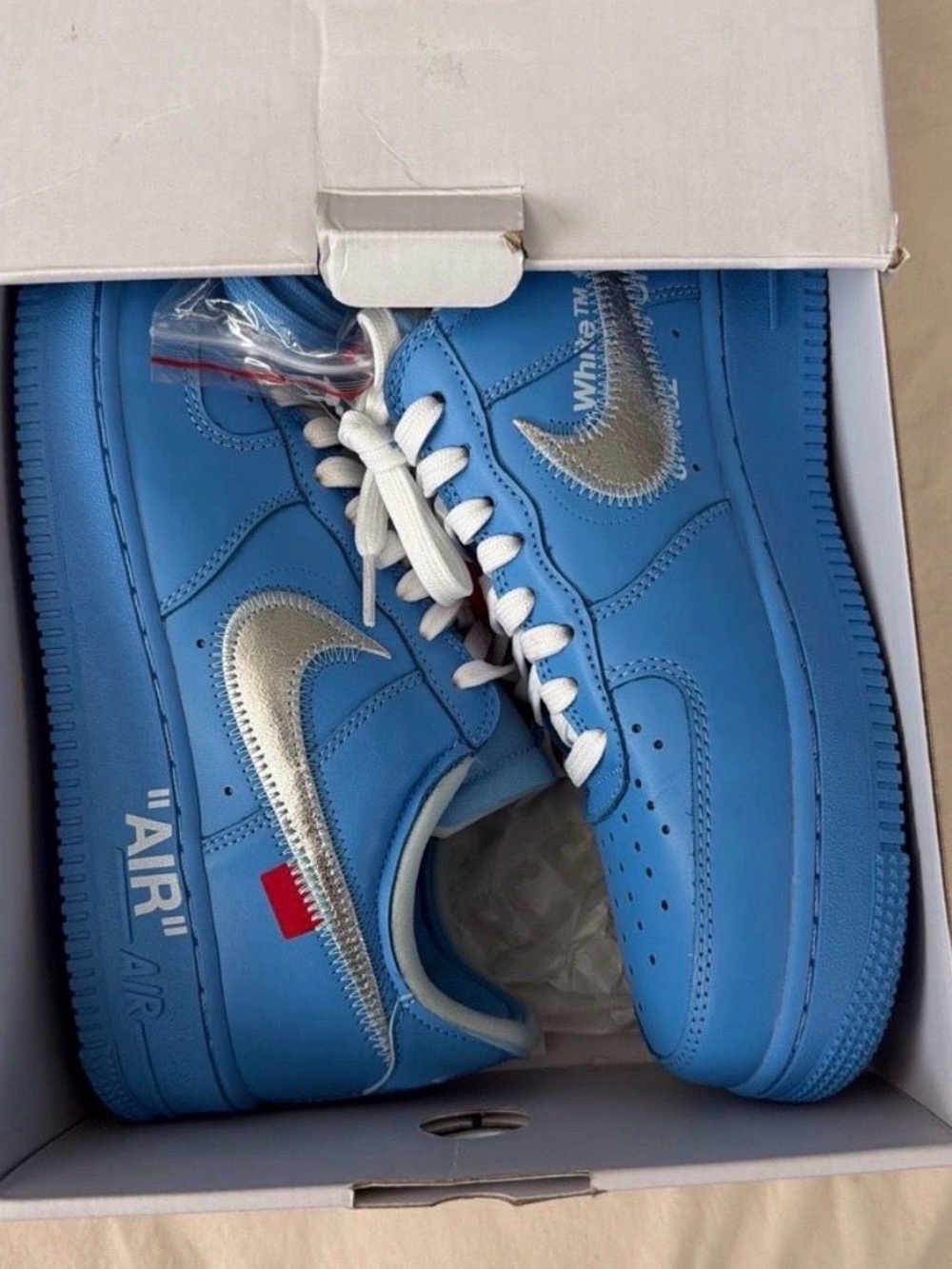 Nike Air Force 1 Low in University Blue with Silver Swoosh - Men's Sneakers